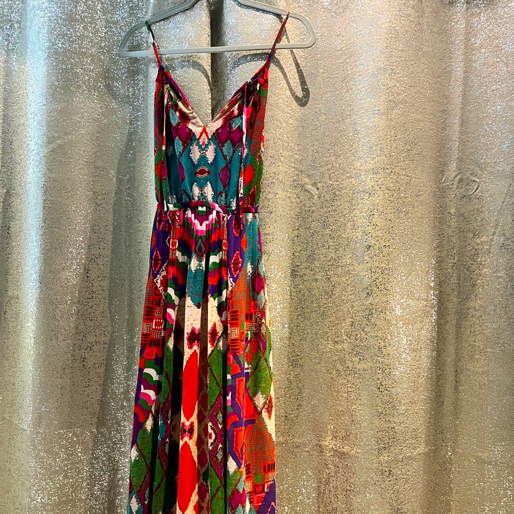 Stunning Maeve floor length spaghetti strap flowy dress.  Corset tie in back.